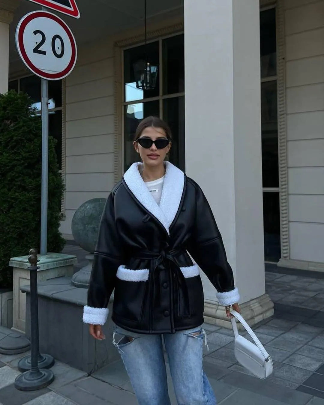 Manteau ceinturé cuir effet mouton oversize