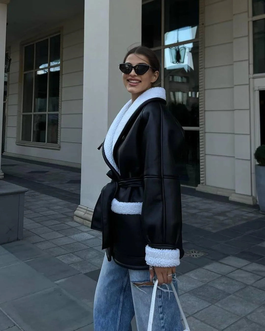 Manteau ceinturé cuir effet mouton oversize