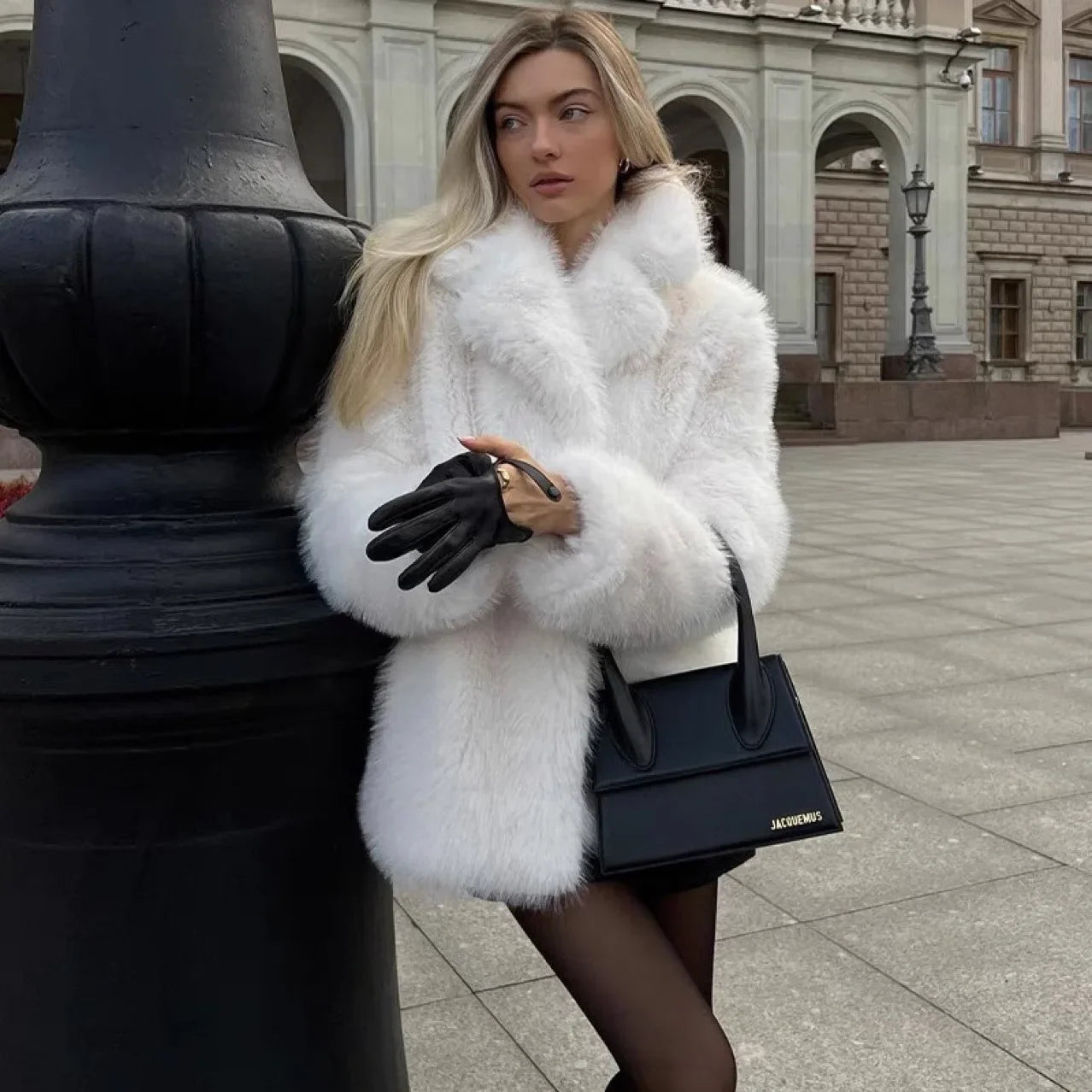 Manteau court fausse fourrure col châle