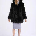 Manteau capuche fausse fourrure