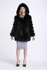 Manteau capuche fausse fourrure