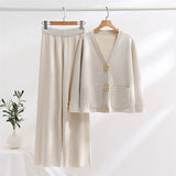 Ensemble maille boutons dorés col-V pantalon-long