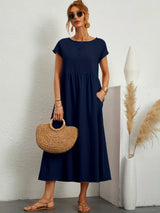 Robe ample col rond poches discrètes