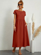 Robe ample col rond poches discrètes