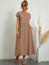 Robe ample col rond poches discrètes