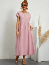 Robe ample col rond poches discrètes