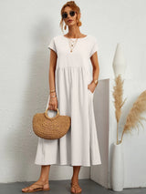 Robe ample col rond poches discrètes