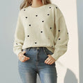 Pull doux à col rond cœur brodé